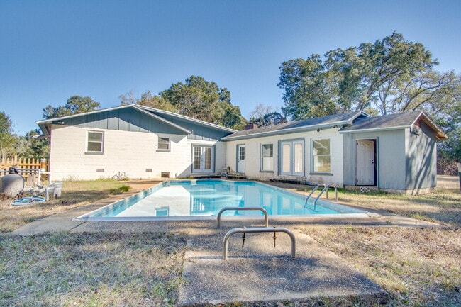 Photo - Stunning 4BR/2BA Pensacola Home with Private Pool, Modern Kitchen, Luxury Vinyl Flooring, Fully F...
