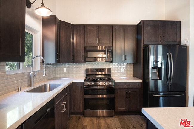 Building Photo - 4810 Hollow Corner Rd Unit 242