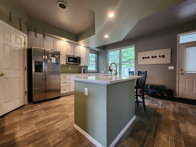 Photo - Stunning 3 Bedroom Townhome Tucked Away In...