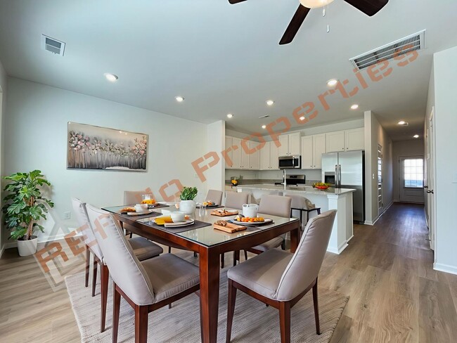 Photo - Move In by April 30 & Save $200/Month! Townhome Only $1,695! Regular $1,950 — Available NOW