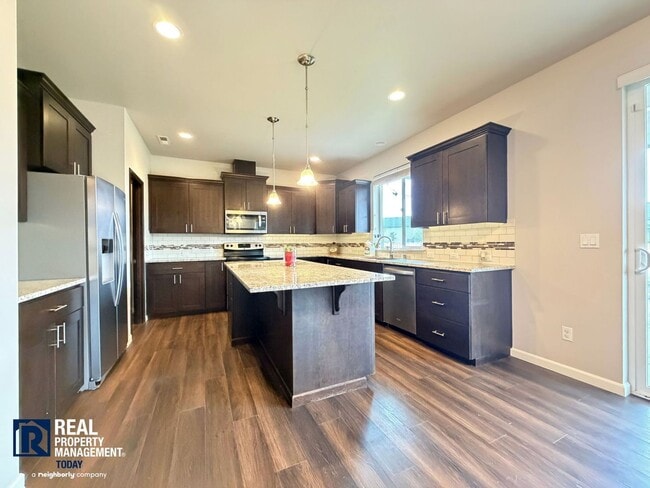 Photo - Spacious 5BR Home | Fenced Yard | Garage | Pets Negotiable