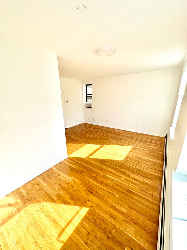 Living Room / Dining Area - 2322 Adam Clayton Powell Jr Blvd Unit 5D