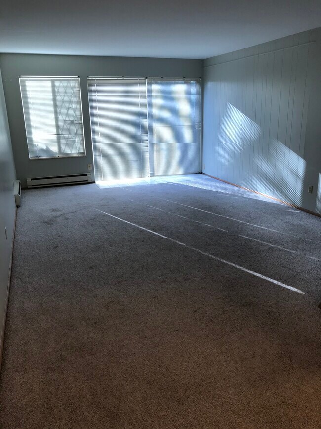 Living area with access to patio - Margan Apartments