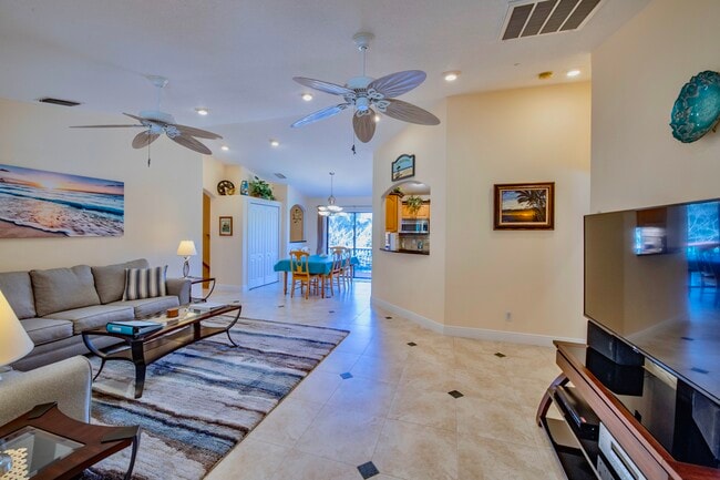 Living room with view into dinning room - 6710 S Highway A1A