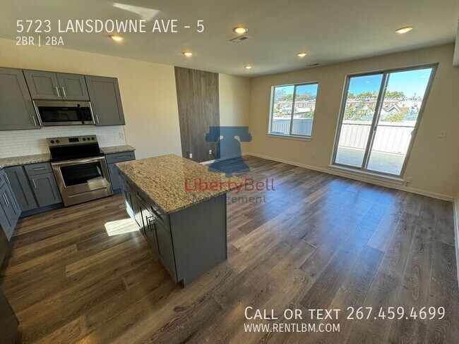 Building Photo - 5723 Lansdowne Ave Unit 5