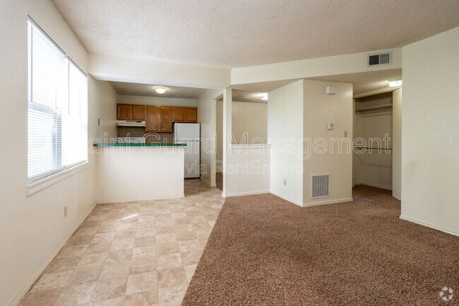 Building Photo - 1905 E 24th Ave Unit B7 Rental