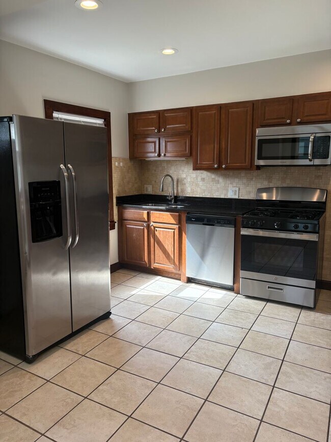 Photo - 35-37 W. Como Ave. Unidad 35