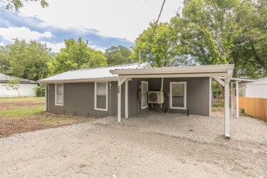 Building Photo - "Charming 2-Bedroom Retreat with Huge Yard... Rental
