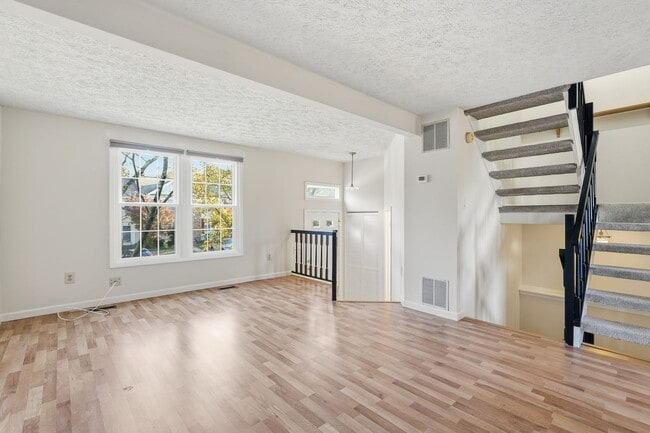 Photo - Discover this beautiful brick-front townho...