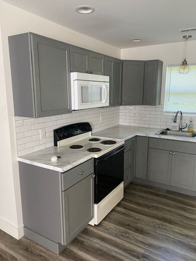 Photo - Farmhouse Finishes Near the Heartbeat of t...