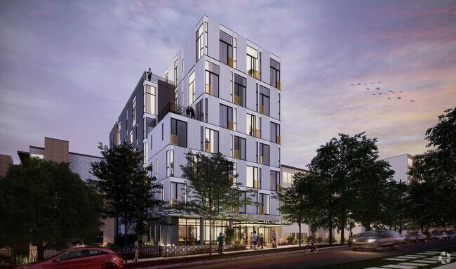 Exterior view of a tall building with a modern design at Alt Capitol Hill. - Alt Capitol Hill Rental