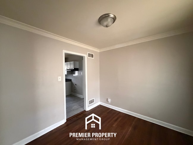 Photo - Charming 3BR Home in 38117 | Hardwood Floors & Large Fenced Backyard