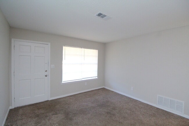 Photo - Updated 2BR/1BA Duplex Off 9 Mile Rd | All Tile Flooring | Pet-Friendly | Immediate Move-In Unit H1