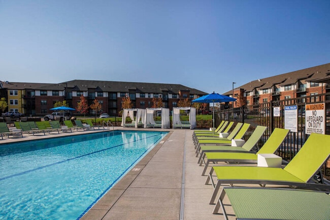 Soak up some sun after a long day with our private swimming pool, lounge chairs and resort-style cabanas. - Ascend at Woodbury Rental
