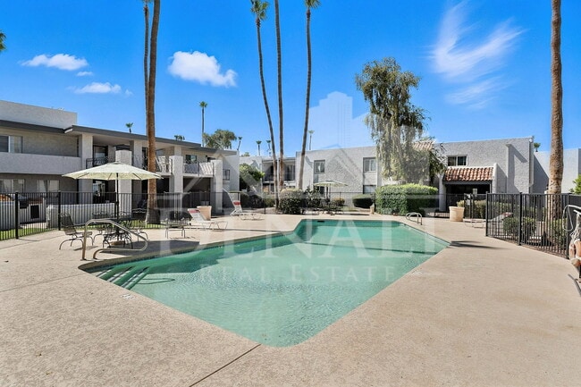 Building Photo - 3313 N 68th St Unit 229e