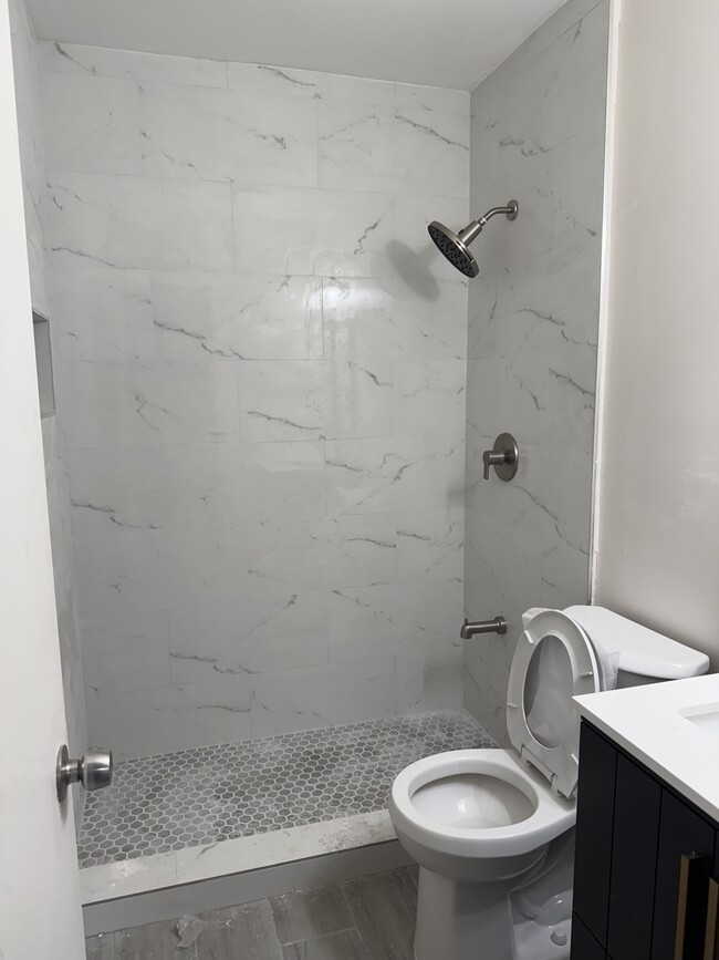 Photo - 760 W 30th St Apartments Unit A2