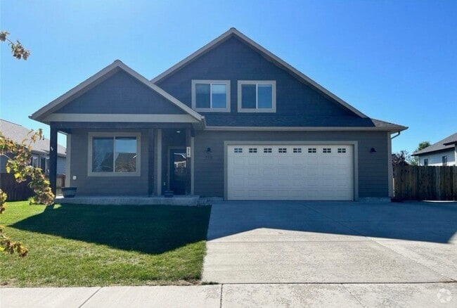 Building Photo - Charming 4-Bedroom Home with Spacious Lawn...