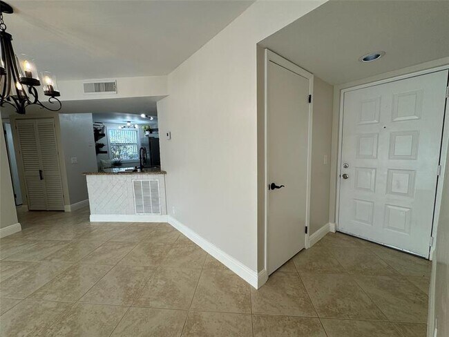 Photo - 9033 Wiles Rd Unit 208