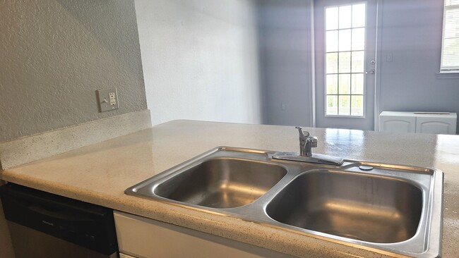 Photo - Upgraded 1brm condo with luxury vinyl flooring and modern lighting.