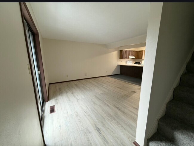 Living room heading upstairs - 624 Portage Lakes Dr