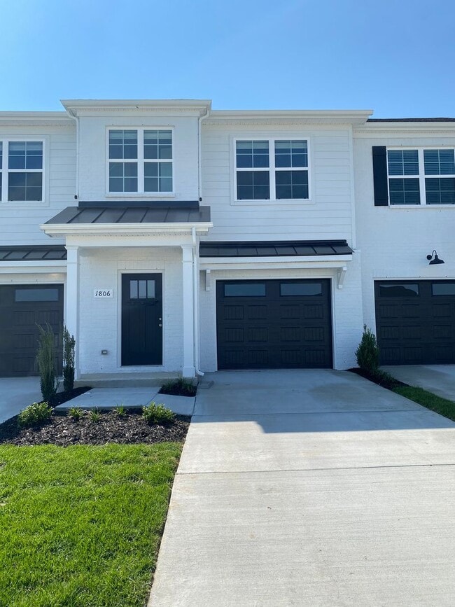 Photo - Like New Luxury Townhome! 3 BR, 2.5 BA, 1 Car Garage, Pool, Dog Park, and More!