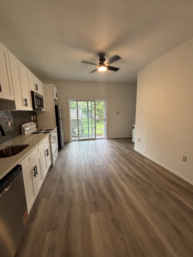 Patio sliding doors to a private deck out back. - 17 E Glenside Ave Unit 1