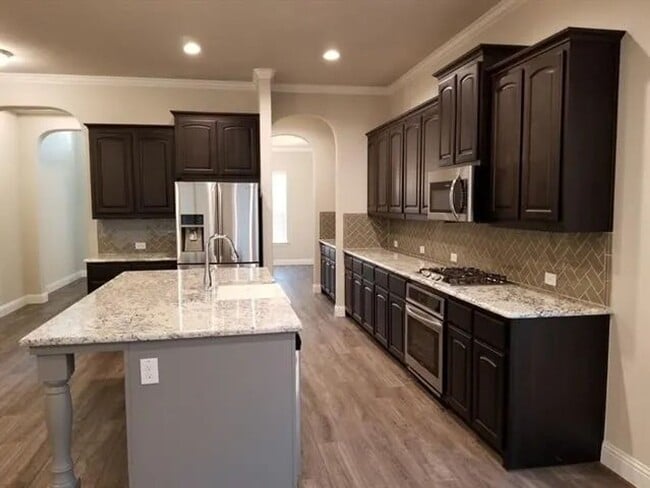 Photo - Coming Soon! 4BR/3.5BA | Updated Single Family Home | 2-Car Garage Parking | Fenced backyard