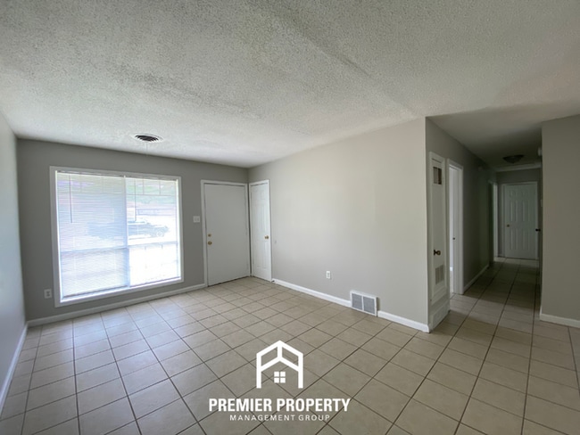 Photo - Spacious 4BR Family Home in Raleigh | Modern Tile Floors & Spacious Backyard