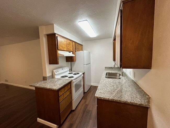 Photo - Remodeled Unit Of A Duplex with Central AC & Fenced Back Yard / Will Consider A Small Pet