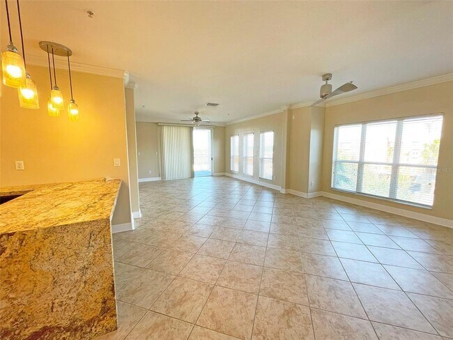 Building Photo - 7580 Toscana Blvd Unit 834