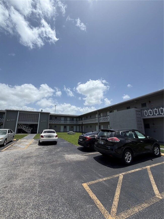 Building Photo - 6720 Arbor Dr Unit 212