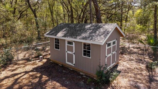 Photo - *** NOT READY FOR SHOW OR MOVE IN UNTIL AUGUST 1 *** Newer 3/2 in the country with fenced yard an...