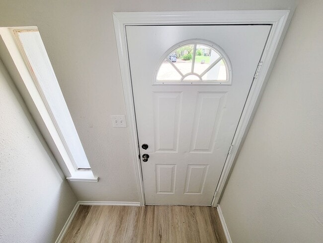 Photo - Welcome home! This beautifully renovated 3-bedroom, 2-bathroom property features top-tier finishe...