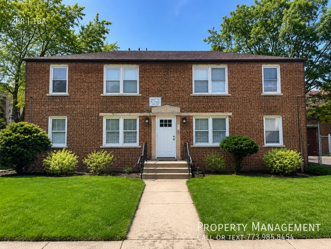 Building Photo - 8153 S Colfax Ave Unit 8155-2