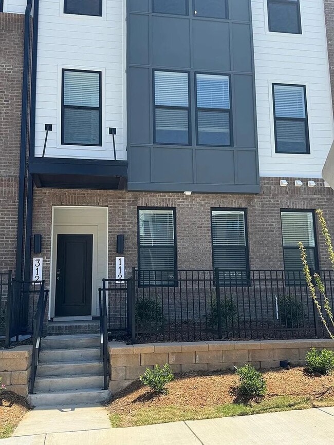 Building Photo - Stunning New Construction 3BD, 2.5BA Cary Townhome-Style Condo with a 1-Car Garage in a Prime Loc...