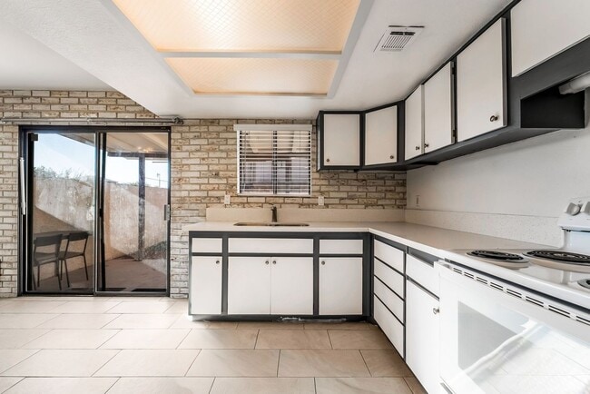 Photo - Immaculate two story townhome style condo ...