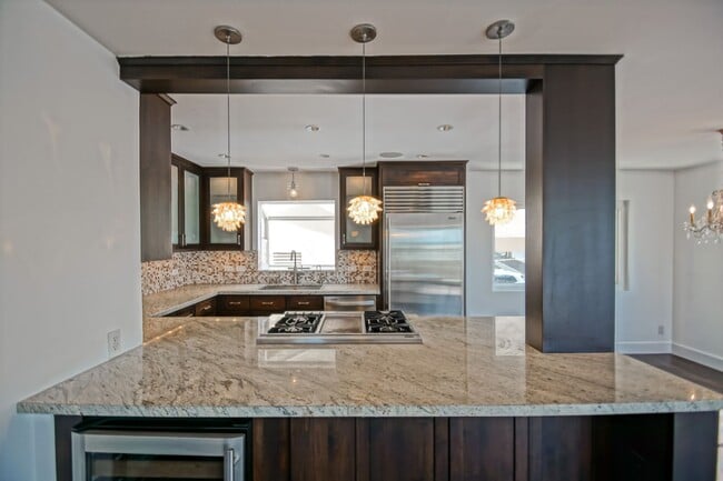 Photo - BEAUTIFULLY REMODELED & BRIGHT 2-STORY APARTMENT W/ OCEAN & PIER VIEWS, BALCONY & 2-CAR PARKING I... Unit C