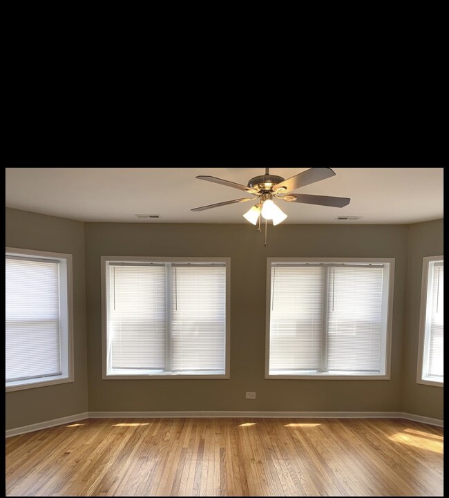 Living Room - 8522 S Bennett Ave Apartments Unit #1