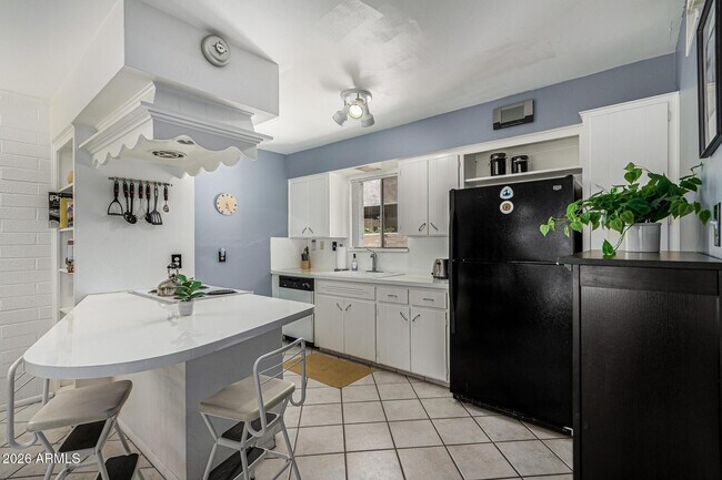 Photo - 6824 E 2nd St Unit 113