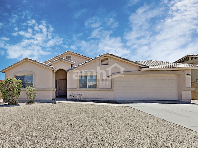 Building Photo - 7547 W Vermont Ave