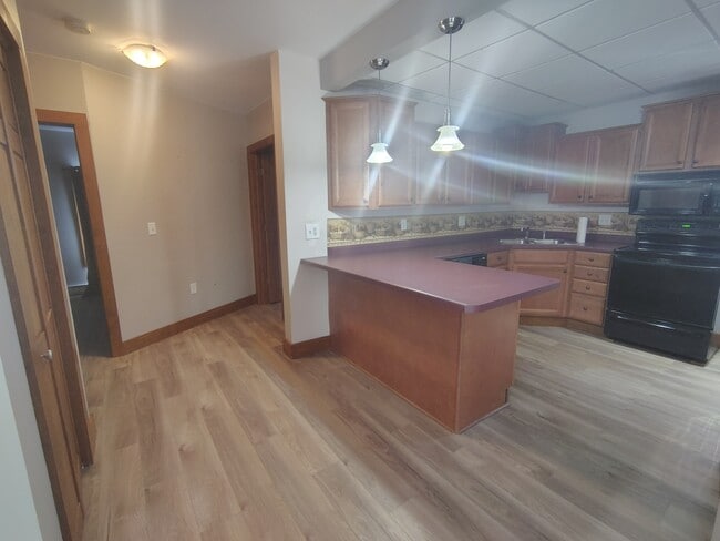 Kitchen w/bathroom and bedroom #2 door - 615 Lake St