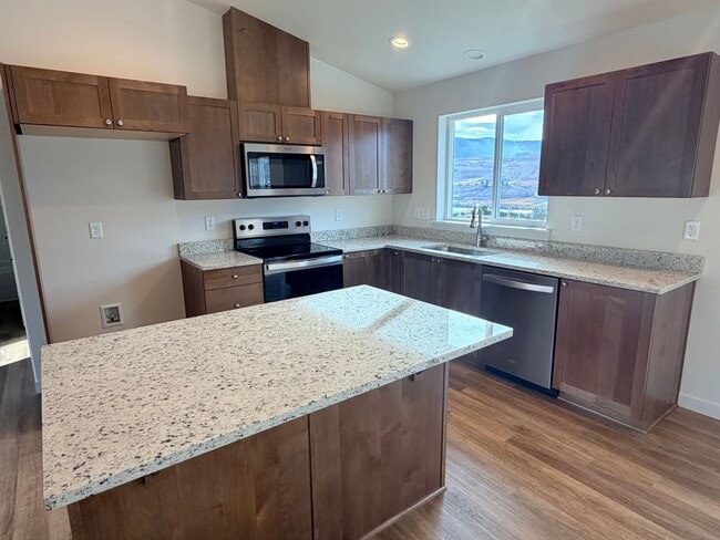 Photo - BRAND NEW construction! 3 beds, 2 baths, double garage, deck with VIEWS and more!