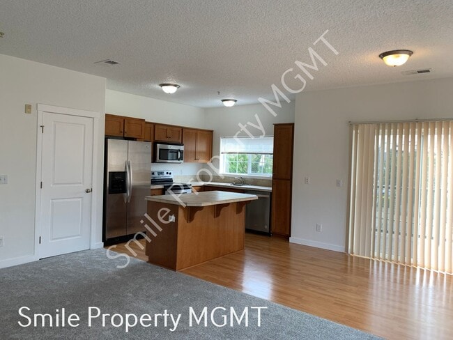 Photo - A great condo with 2 bedrooms and 2.5 bathrooms, single car garage in gated community in Happy Va...