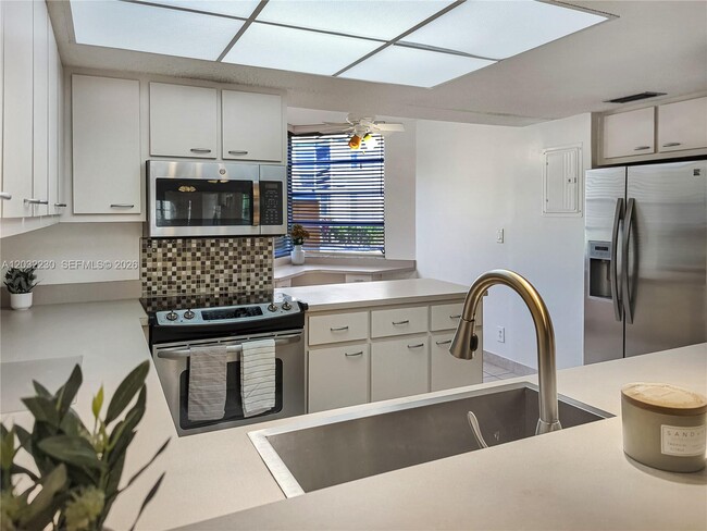 Building Photo - 9531 Seagrape Dr Unit 108