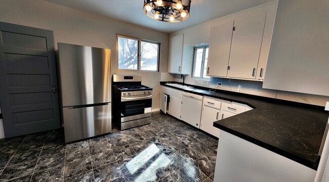 Photo - Charming Newly Renovated 3-Bedroom Rental with Garage & Basement