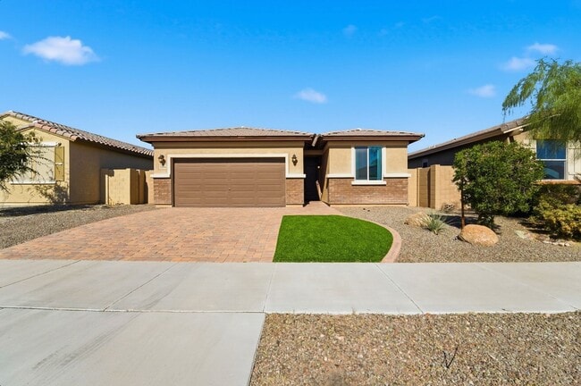 Building Photo - Modern Surprise Home with 3-Car Garage and Designer Upgrades