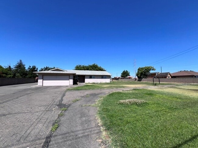 Photo - Freshly painted 4 bedroom home on over 2 acres of land.