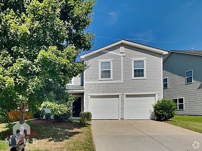 Building Photo - 6215 Woodland Commons Dr Rental