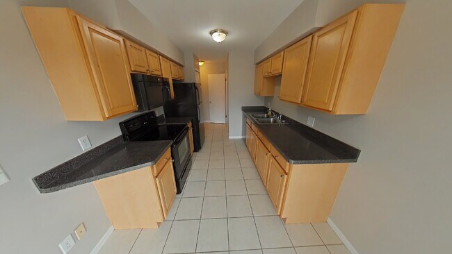 Photo - "2-Bed Condo Retreat in Clinton Township – Cozy Comfort Awaits!" Unit #125