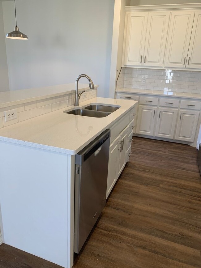 Photo - Brand new open concept quartz countertops Unit A